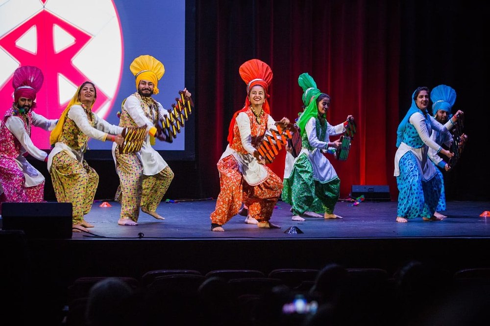 Bhangra dancers performing at a festival