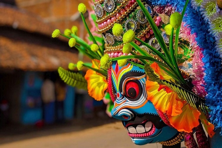 Chhau mask dancer mid-performance